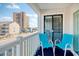 Balcony with two chairs and ocean view at 191 Maison Dr. # B206, Myrtle Beach, SC 29572