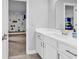 Clean bathroom with single sink vanity and view of playroom at 206 Calhoun Falls Dr., Myrtle Beach, SC 29579