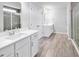 Modern bathroom with double sinks, a shower, and tile flooring at 206 Calhoun Falls Dr., Myrtle Beach, SC 29579