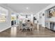 Open concept dining area with hardwood floors and kitchen views at 206 Calhoun Falls Dr., Myrtle Beach, SC 29579