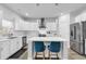 Modern kitchen with white cabinets, center island, and stainless steel appliances at 206 Calhoun Falls Dr., Myrtle Beach, SC 29579