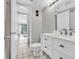 Neat bathroom featuring a modern sink, tiled floors, and bright lighting at 210 75Th Ave N # 4010, Myrtle Beach, SC 29572