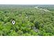 This home is a serene retreat, tucked away in a beautiful forest, offering peace and quiet at 2102 Calabash Circle, Little River, SC 29566