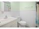 Neat bathroom with a classic sink and a mirror, exuding simplistic functionality at 2102 Calabash Circle, Little River, SC 29566