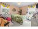 Bedroom with white wicker furniture and window at 2102 Calabash Circle, Little River, SC 29566