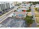 Aerial view of colorful triplex with spacious parking lot at 2102 S Ocean Blvd. # D, North Myrtle Beach, SC 29582