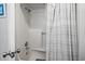 Clean shower with gray striped curtain at 2102 S Ocean Blvd. # D, North Myrtle Beach, SC 29582