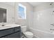 Clean bathroom with a tub, shower, and dark vanity at 245 Six Mile Creek Dr., Georgetown, SC 29440