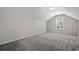 Cozy attic bedroom with grey carpet and window at 245 Six Mile Creek Dr., Georgetown, SC 29440