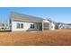 House exterior with screened porch at 245 Six Mile Creek Dr., Georgetown, SC 29440