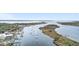 Aerial view of Georgetown harbor, showcasing boats and waterfront properties at 3009 South Bay St., Georgetown, SC 29440