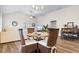 Dining area with wicker chairs, glass table, and chandelier at 3009 South Bay St., Georgetown, SC 29440