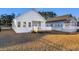 White house with deck and grassy backyard at 3009 South Bay St., Georgetown, SC 29440