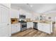 Bright kitchen with stainless steel appliances and granite countertops at 3009 South Bay St., Georgetown, SC 29440