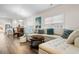 Spacious living room featuring a sectional sofa and large windows at 3009 South Bay St., Georgetown, SC 29440