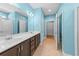 Double vanity bathroom with dark brown cabinets at 3047 Honey Clover Ct., Longs, SC 29568