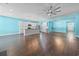 Open concept living space with hardwood floors and kitchen island at 3047 Honey Clover Ct., Longs, SC 29568