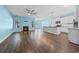 Bright living room with fireplace and hardwood floors at 3047 Honey Clover Ct., Longs, SC 29568