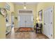 Bright entryway with tiled floor, double doors, and a charming chair at 311 Highfield Loop, Myrtle Beach, SC 29579