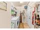 Laundry room with washer, dryer, and ample storage shelving at 311 Highfield Loop, Myrtle Beach, SC 29579