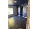 Image shows a bedroom with purple walls and dark flooring at 3586 Cluster Ln., Myrtle Beach, SC 29579