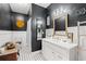 Clean bathroom with dark walls and white vanity at 3618 Highway 430, Nichols, SC 29581