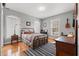 Cozy bedroom with hardwood floors and a rustic feel at 3618 Highway 430, Nichols, SC 29581