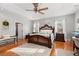 Main bedroom with hardwood floors and ensuite bathroom access at 3618 Highway 430, Nichols, SC 29581