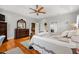 Bright main bedroom with hardwood floors and ensuite bathroom access at 3618 Highway 430, Nichols, SC 29581