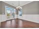 Elegant dining room with hardwood floors and wainscoting at 369 Saint Julian Ln., Myrtle Beach, SC 29579