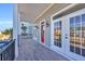 Spacious front porch with tiled flooring and french doors at 369 Saint Julian Ln., Myrtle Beach, SC 29579