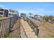 Steps leading up to a row of charming waterfront homes at 369 Saint Julian Ln., Myrtle Beach, SC 29579