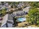 Aerial view of property, pool, and surrounding area at 3700 Golf Colony Lane # 24B, Little River, SC 29566