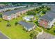 Complex aerial view showing pool, buildings, and landscaping at 3951 Gladiola Ct. # 204, Myrtle Beach, SC 29588