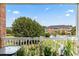 Balcony view of the community pool and landscaping at 3951 Gladiola Ct. # 204, Myrtle Beach, SC 29588