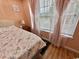 Bedroom with hardwood floors and pink curtains at 3951 Gladiola Ct. # 204, Myrtle Beach, SC 29588