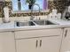 Double stainless steel sink with updated faucet at 3951 Gladiola Ct. # 204, Myrtle Beach, SC 29588