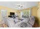 Spacious living room featuring a fireplace and ample seating at 3951 Gladiola Ct. # 204, Myrtle Beach, SC 29588