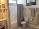 Cozy bathroom with a shower/tub combo, toilet, and a single sink at 41 Federation Loop, Pawleys Island, SC 29585