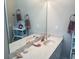 Bathroom has a double sink vanity with white cabinets at 41 Federation Loop, Pawleys Island, SC 29585