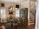 Formal dining room with glass-top table and ornate furniture at 41 Federation Loop, Pawleys Island, SC 29585