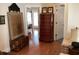 Hallway with decorative chest, painted heron art and views to the exterior at 41 Federation Loop, Pawleys Island, SC 29585