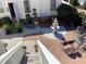 Overhead view of a beautifully landscaped brick patio, including an ornate fountain and seating area at 41 Federation Loop, Pawleys Island, SC 29585