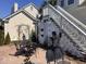 Outdoor patio with elegant seating, fountain, and lush greenery, perfect for relaxation at 41 Federation Loop, Pawleys Island, SC 29585