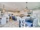 Elegant kitchen with a large dining table and seating for many at 4208 N Ocean Blvd., North Myrtle Beach, SC 29582