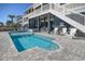 Private pool with lounge chairs and a waterfall feature at 4208 N Ocean Blvd., North Myrtle Beach, SC 29582