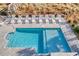 Aerial view of resort style pool with lounge chairs at 4208 N Ocean Blvd., North Myrtle Beach, SC 29582