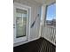 Private balcony with water views and railing at 4413 East Port Blvd. # F-6, Little River, SC 29566