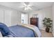 Bedroom with a queen-size bed and ceiling fan at 4413 East Port Blvd. # F-6, Little River, SC 29566