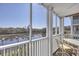 Relaxing screened balcony overlooking marina and waterway at 4413 East Port Blvd. # F-6, Little River, SC 29566